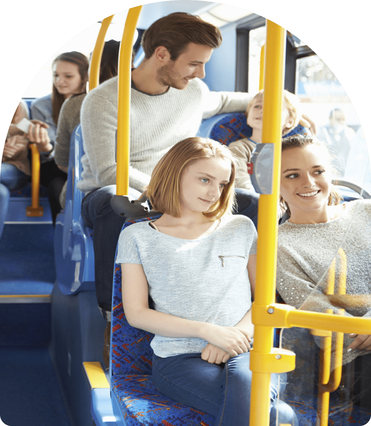 People sitting and talking on a bus.